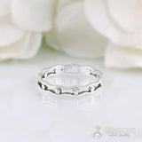 Silver Ring-Trapped Pearls