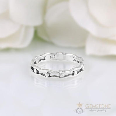 Silver Ring-Trapped Pearls