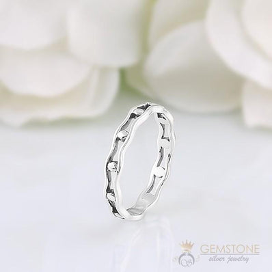 Silver Ring-Trapped Pearls