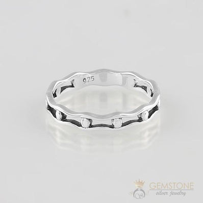 Silver Ring-Trapped Pearls