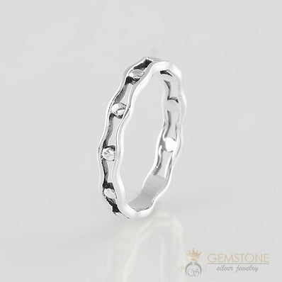 Silver Ring-Trapped Pearls